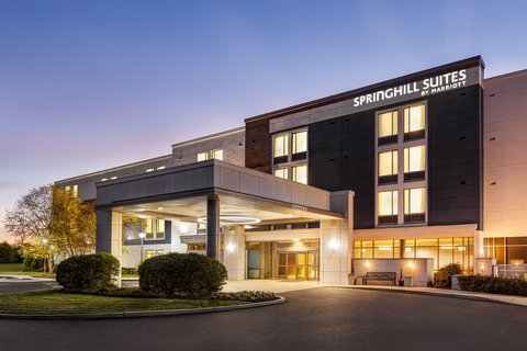 Springhill Suites by Marriott hotel entrance at twilight with modern architecture.